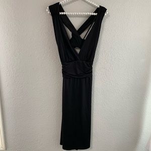 Plunging neck line open twice back black dress